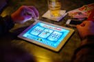 A bar patron played electronic pulltabs at a bar in Coon Rapids.