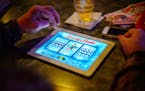 A bar patron played electronic pulltabs at a bar in Coon Rapids.