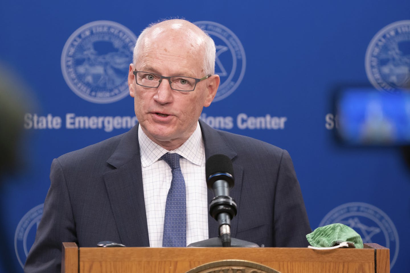 MMB Commissioner Myron Frans speaks during a press conference with Gov. Tim Walz Tuesday, May 5, 2020 with MMB Commissioner Myron Frans to discuss the State of Minnesota's budget projection. The state's budget outlook crumbled from a $1.5 billion surplus to a projected $2.4 billion deficit in just two months, as the COVID-19 pandemic eats up tax revenue and Minnesota leaders accelerate spending to respond. (Glen Stubbe/Star Tribune via AP, Pool)