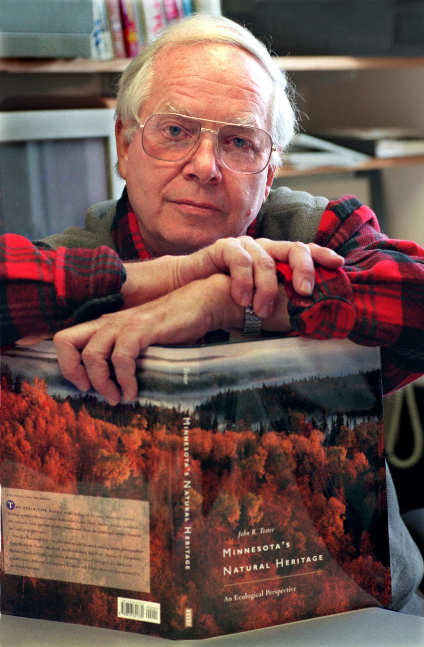 John Tester, with his book "Minnesota's Natural Heritage," when it was published in 1995. ORG XMIT: MER50d38e92d4aa0a775fe7151b94f73