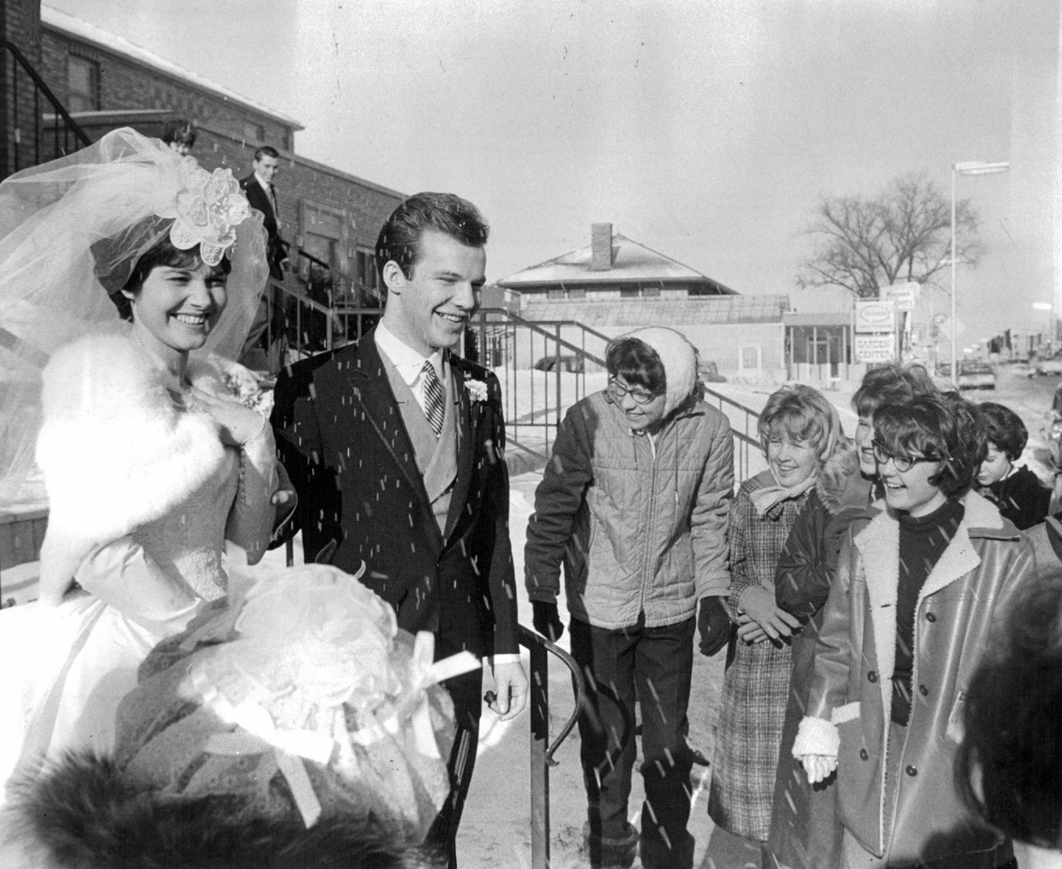 December 29, 1963 Fans and friends greeted Bobby Vee and his new wife Karen as they exited the church.