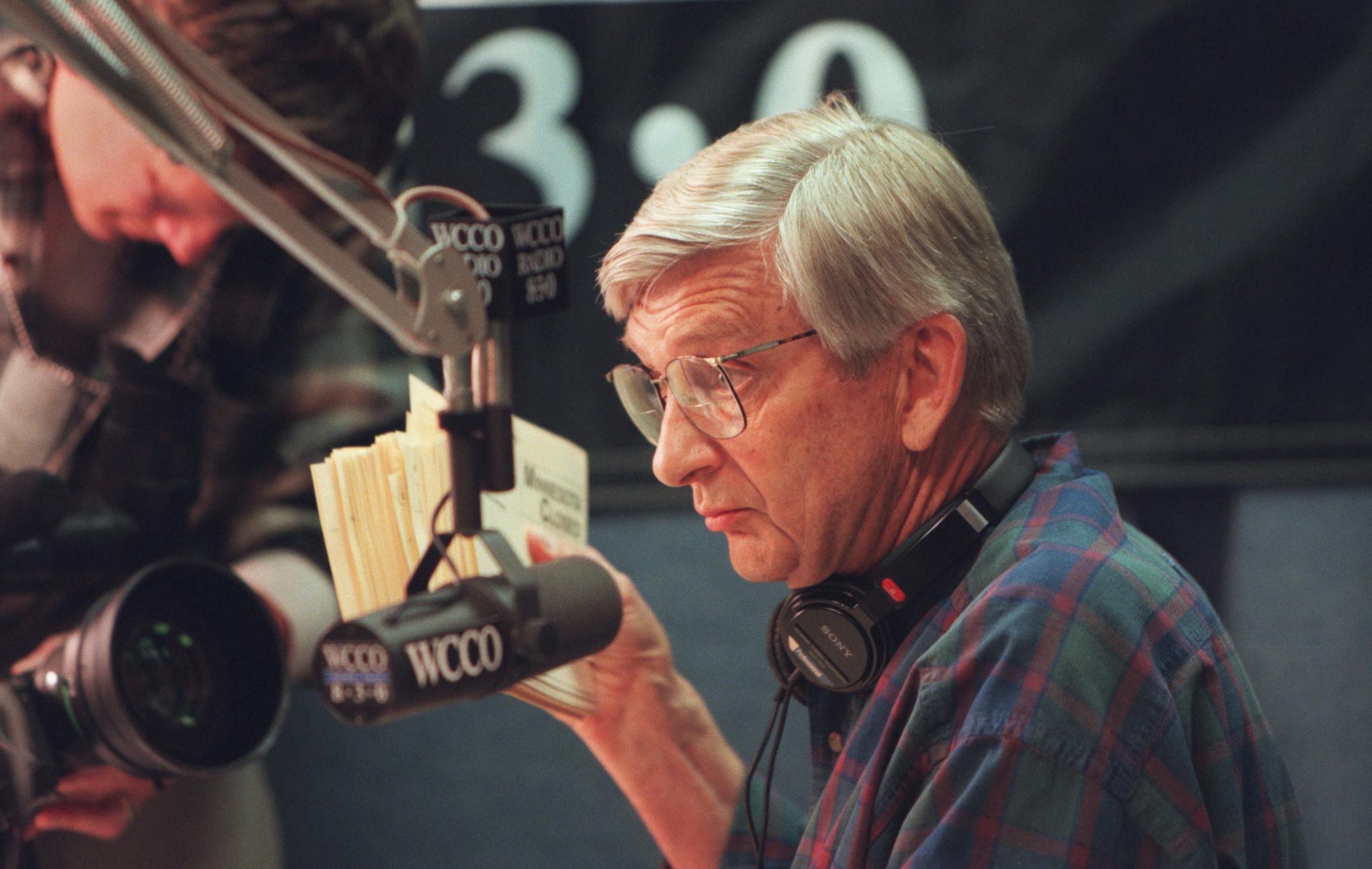In this 1996 photo, Roger Erickson, of WCCO Radio prepares for a show in Minneapolis. Erickson's daughter, Tracy Anderson, said the longtime radio personality died of natural causes at his home in Plymouth on Monday, Oct. 30, 2017. He was 89. (Tom Sweeney/Star Tribune via AP)