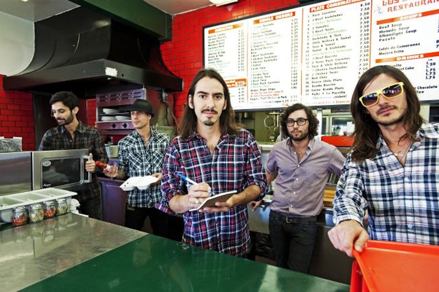 Dhani Harrison (center) and sometime members of his band thenewno2.