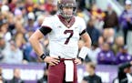 Minnesota's quarterback Mitch Leidner looked to the sideline for guidance in the third quarter as Minnesota took on the Northwestern Wildcats at Ryan 
