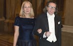 FILE - In this Dec. 11, 2011 file photo, Swedish Academy member Katarina Frostenson, left and photographer Jean Claude Arnault attend the Kings Nobel 
