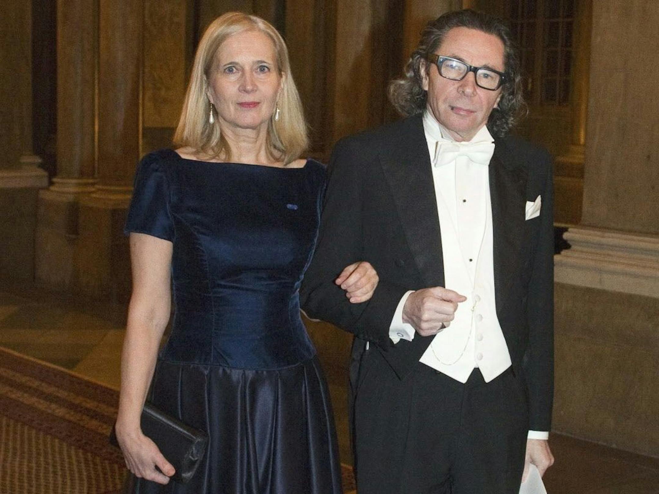 FILE - In this Dec. 11, 2011 file photo, Swedish Academy member Katarina Frostenson, left and photographer Jean Claude Arnault attend the Kings Nobel dinner at the Royal Palace in Stockholm.