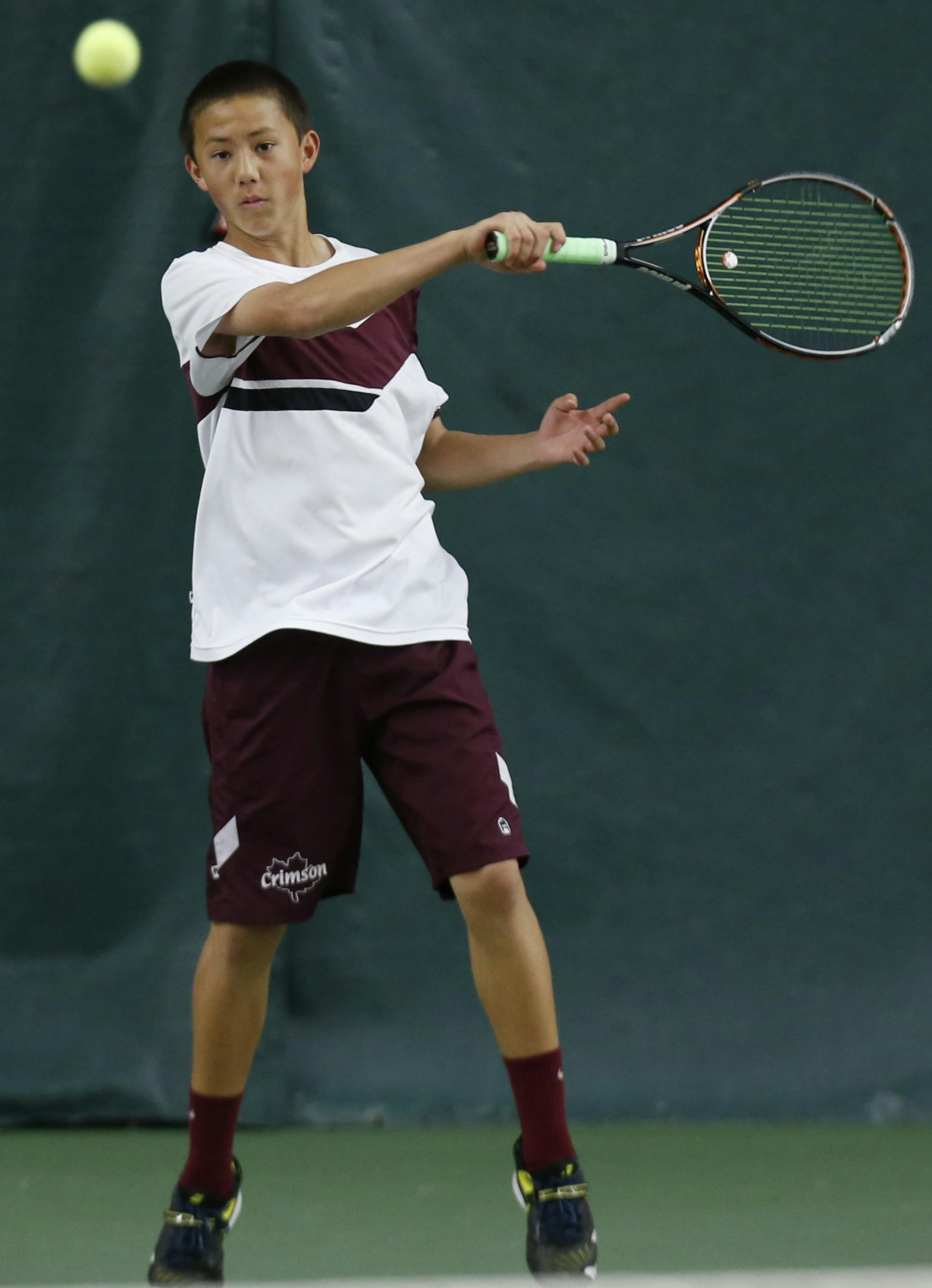 In the Class 2A, Section 5 boys tennis finals between Maple Grove and Mounds View at the Baseline Tennis Center at the U of M, Charlie Adkins returns a ball from Jake Trondson of Mounds View who lost the match.] richard tsong-taatarii@startribune.com