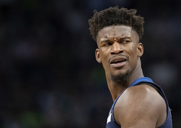 Minnesota Timberwolves' Jimmy Butler (23) reacts to a call in the third quarter in Game 4 of their series against the Rockets Monday, April 23, 2018 a