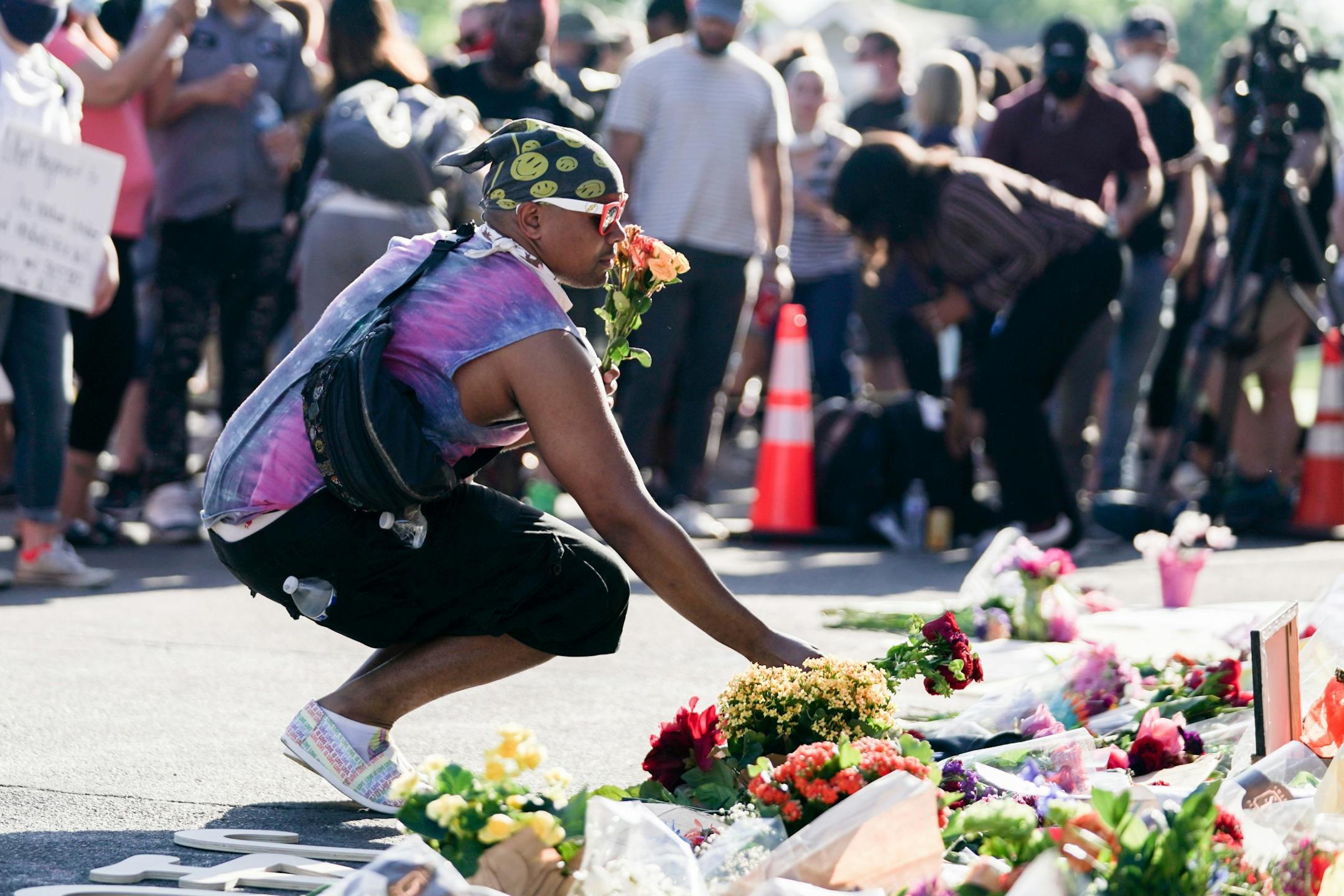 Tony Kennedy came from St. Paul to lay flowers at the George Floyd Memorial at 38th Street & Chicago Avenue. "My heart was scared," he said after violence erupted in the Twin Cities.