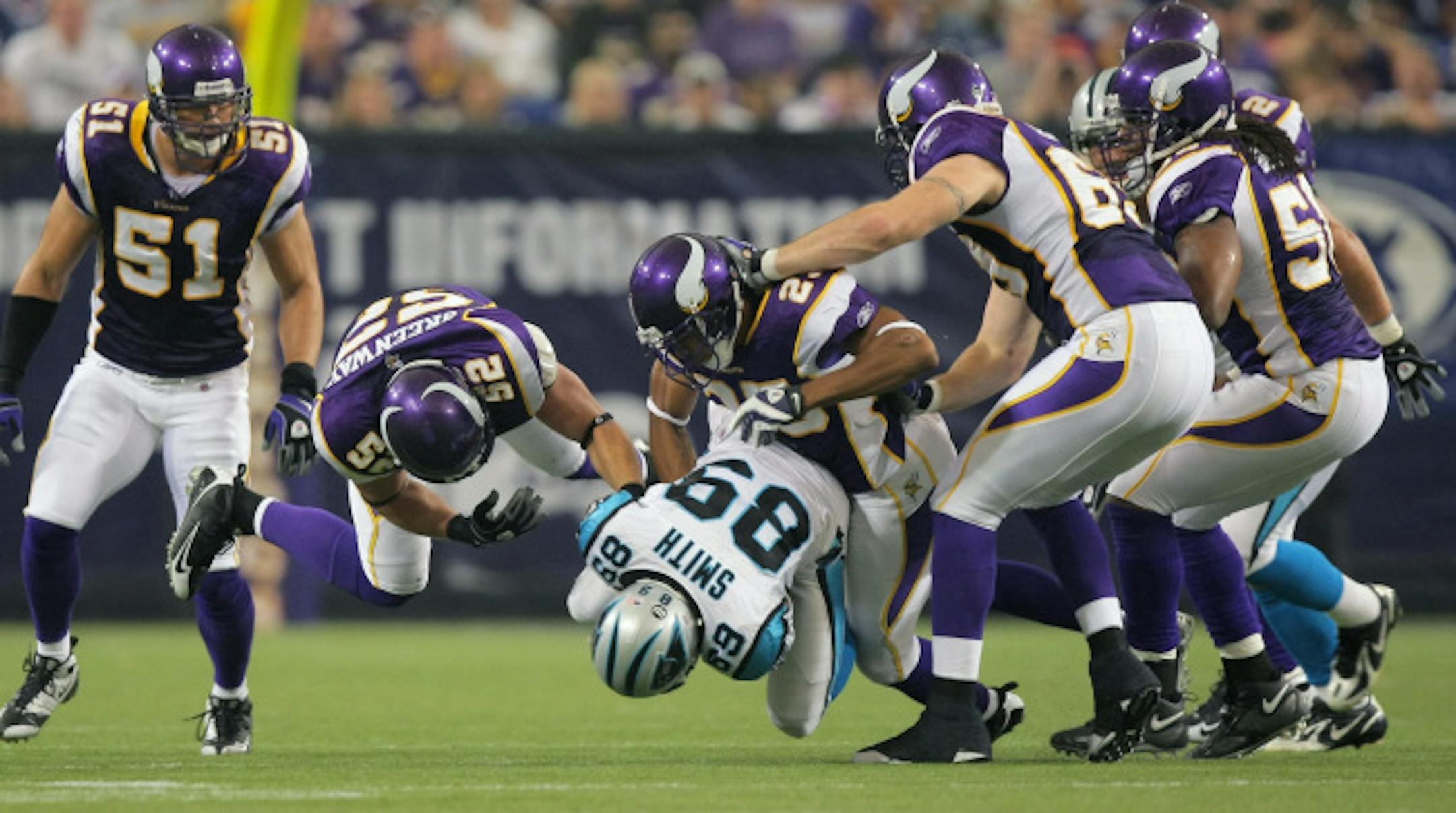 The Vikings defense teamed up to take down Carolina's Steve Smith in the second quarter. It was the wide receiver's first game after a team-imposed two-game suspension.