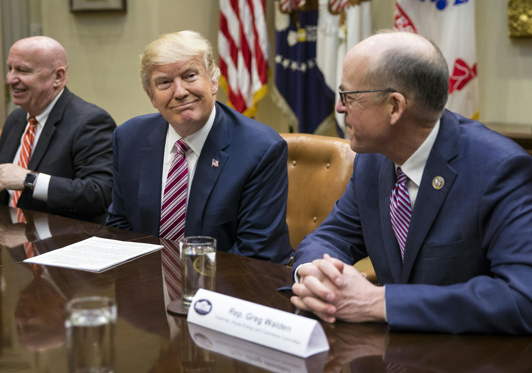 President Donald Trump during for a healthcare discussion with House committee chairs, in the Roosevelt Room of the White House, in Washington, March 10, 2017. From left: Rep. Kevin Brady (R-Texas), chairman of the House Ways and Means Committee, Trump, and Rep. Greg Walden (R-Ore.), chairman of the House Energy and Commerce Committee. (Al Drago/The New York Times)