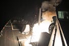 In an image provided by the US Navy, a Tomahawk cruise missile is launched from the USS Ross in a strike on a Syrian air base on April 7, 2017. Presid