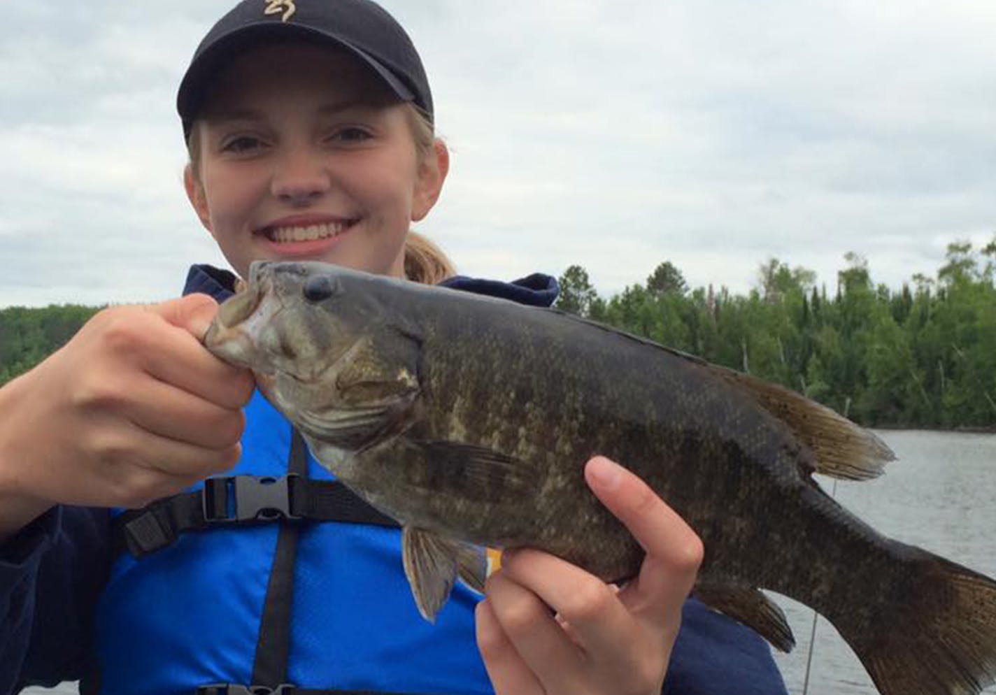 ONE TO REMEMBER Brianna O'Donnell of Richfield caught and released this 17-inch smallmouth bass while fishing with a leech near Orr with her family. ORG XMIT: 8ydriYsrKjOPEjnM6aHB