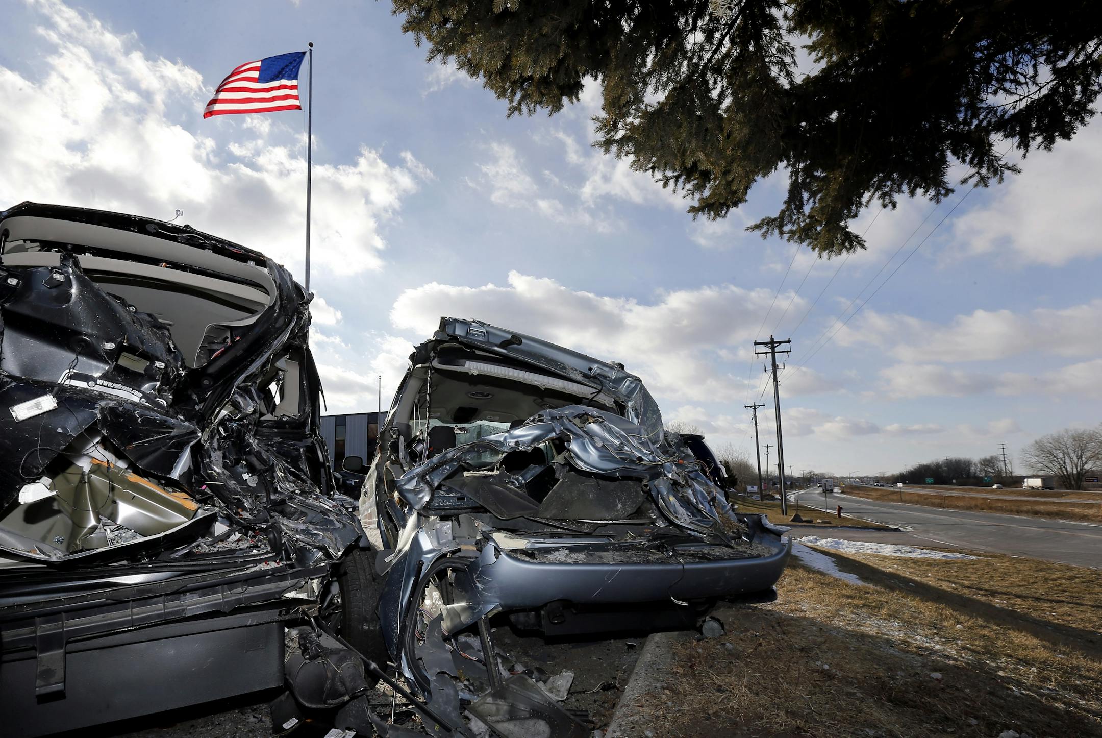 A motorist was killed when her car veered off a major road in Savage late Wednesday morning and struck six parked minivans at Rollx Vans, authorities said.