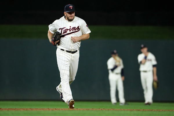 Glen Perkins took over with two out in the ninth inning of a game against Detroit on Sept. 30 in his final appearance for the Twins.