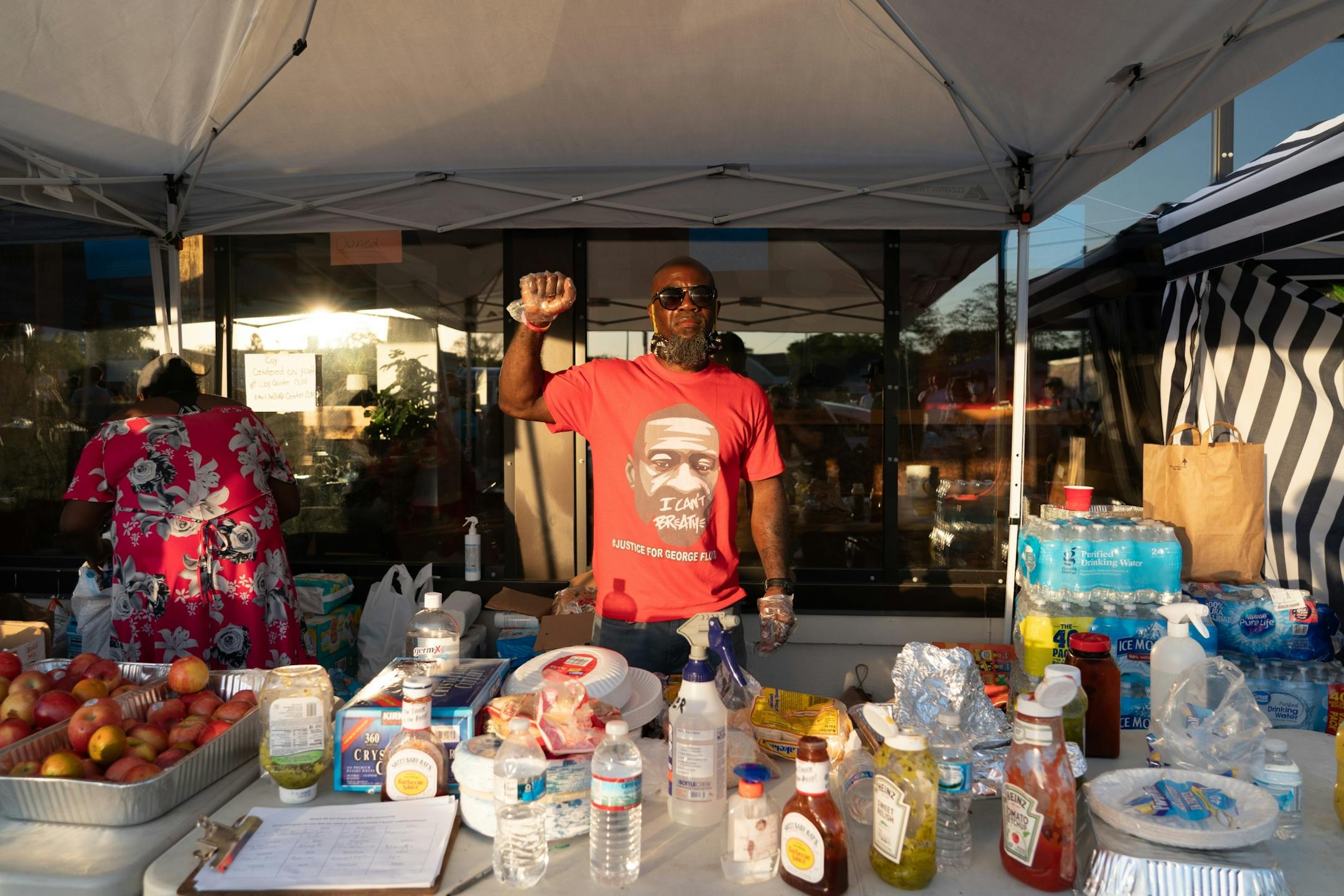 Neighbor Marquise Bowie said "the love" brought him down to a donation share at the George Floyd memorial at 38th Street and Chicago Avenue.