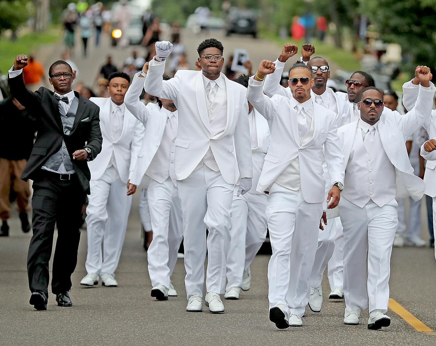 Friends and family of Philando Castile made their way back to Brooks Funeral Home after the funeral, Thursday, July 14, 2016 in St. Paul, MN ] (ELIZABETH FLORES/STAR TRIBUNE) ELIZABETH FLORES &#x2022; eflores@startribune.com