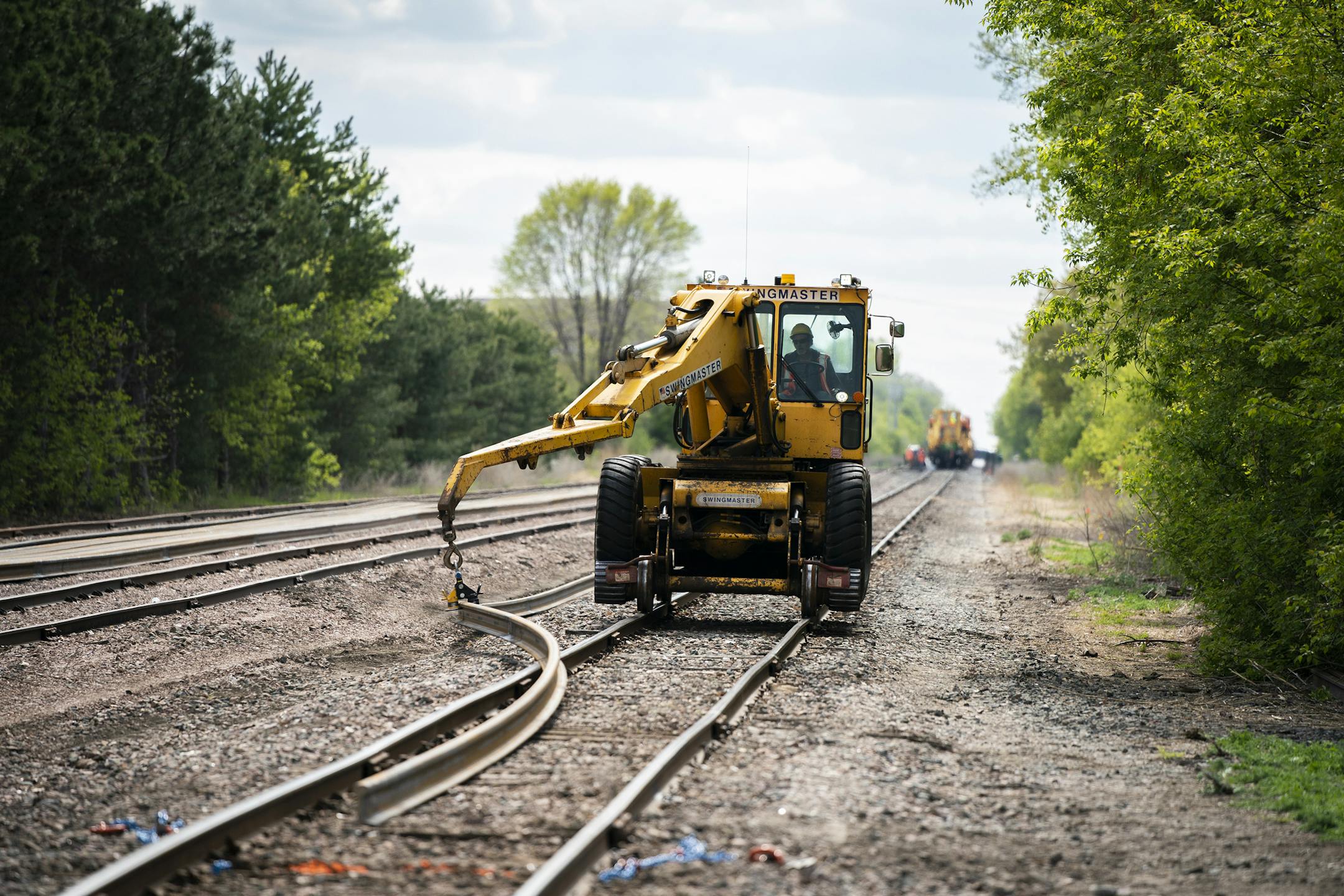 Workers unload and place rail segments for the Southwest Light Rail project on the railroad tracks near the future Beltline Boulevard Station in St. Louis Park. ] LEILA NAVIDI ¥ leila.navidi@startribune.com BACKGROUND INFORMATION: Construction begins on the Southwest Light Rail project on the railroad tracks at the future Beltline Boulevard Station in St. Louis Park on Monday, May 13, 2019.