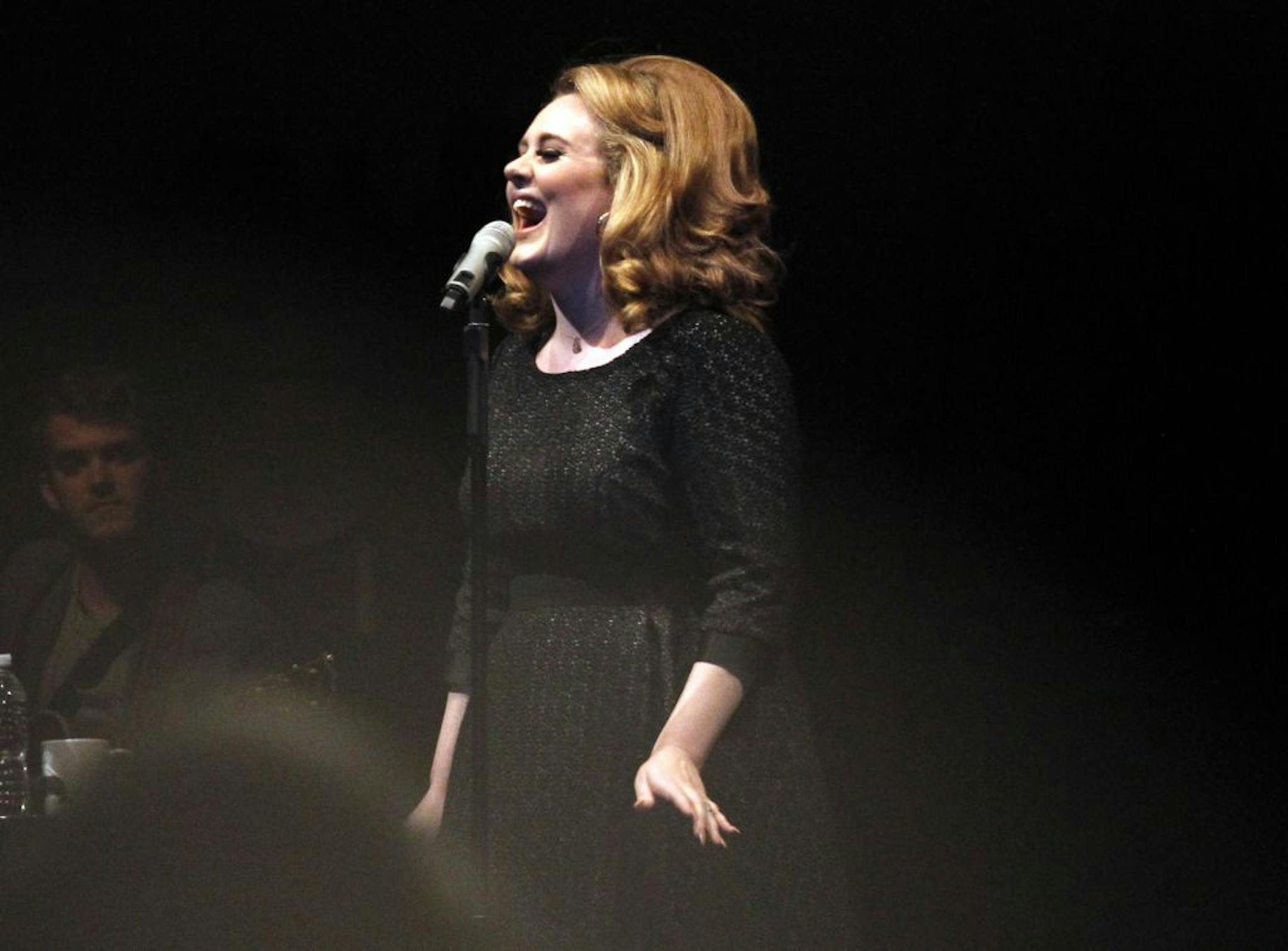 Adele's speaking voice has a strong London accent, but when singing the accent all but fades away.