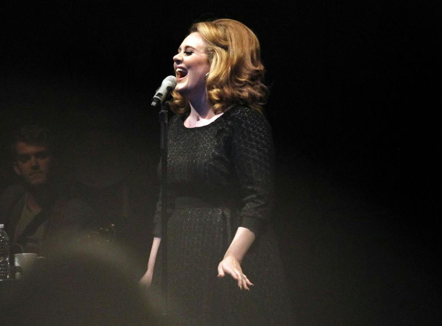 Adele's speaking voice has a strong London accent, but when singing the accent all but fades away.