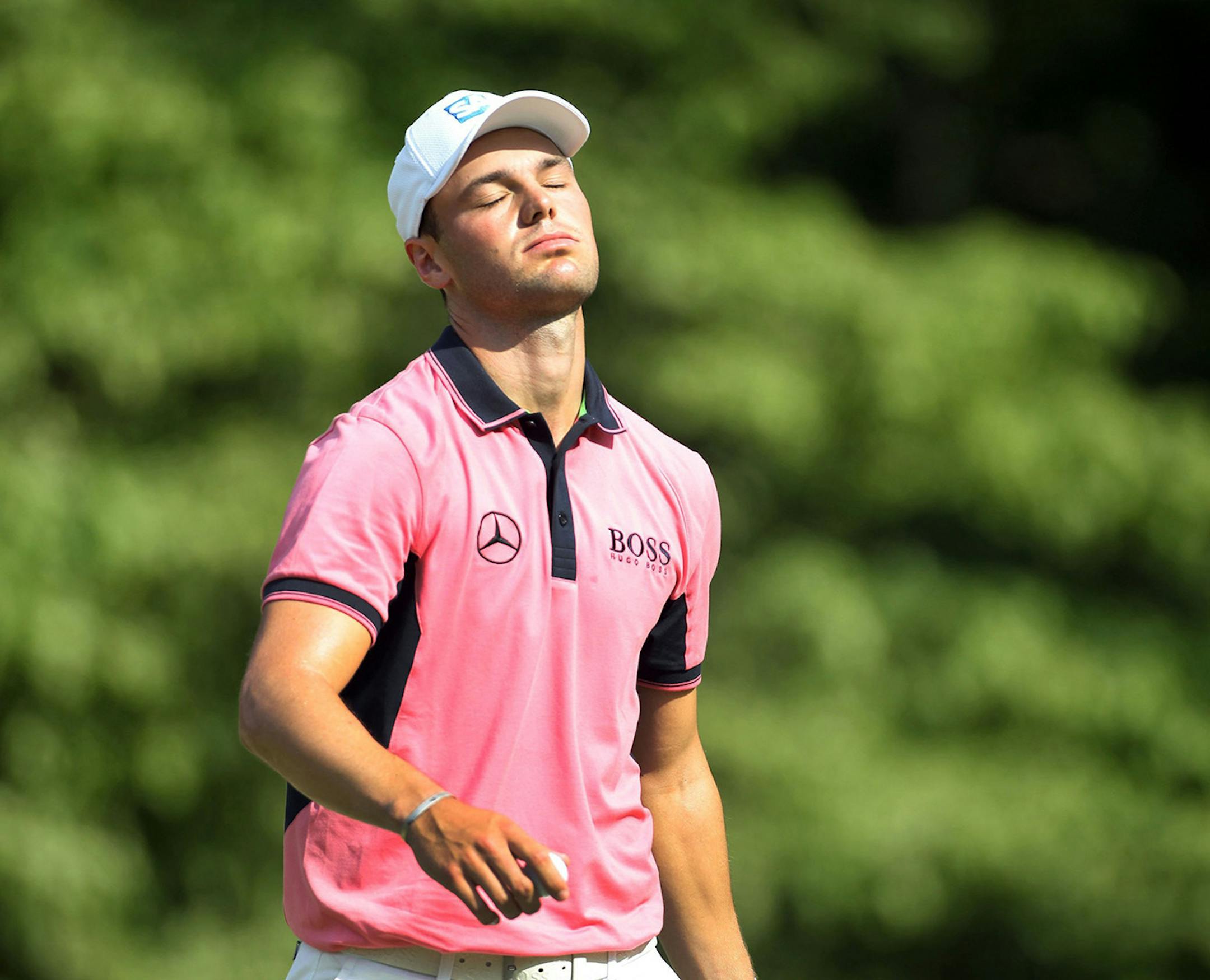 Golfer Martin Kaymer of Dusseldorf, Germany, reacts after a bogey on the sixth hole during the third round of the 2014 U.S. Open at Pinehurst No. 2 in Pinehurst, N.C., Saturday, June 14, 2014.