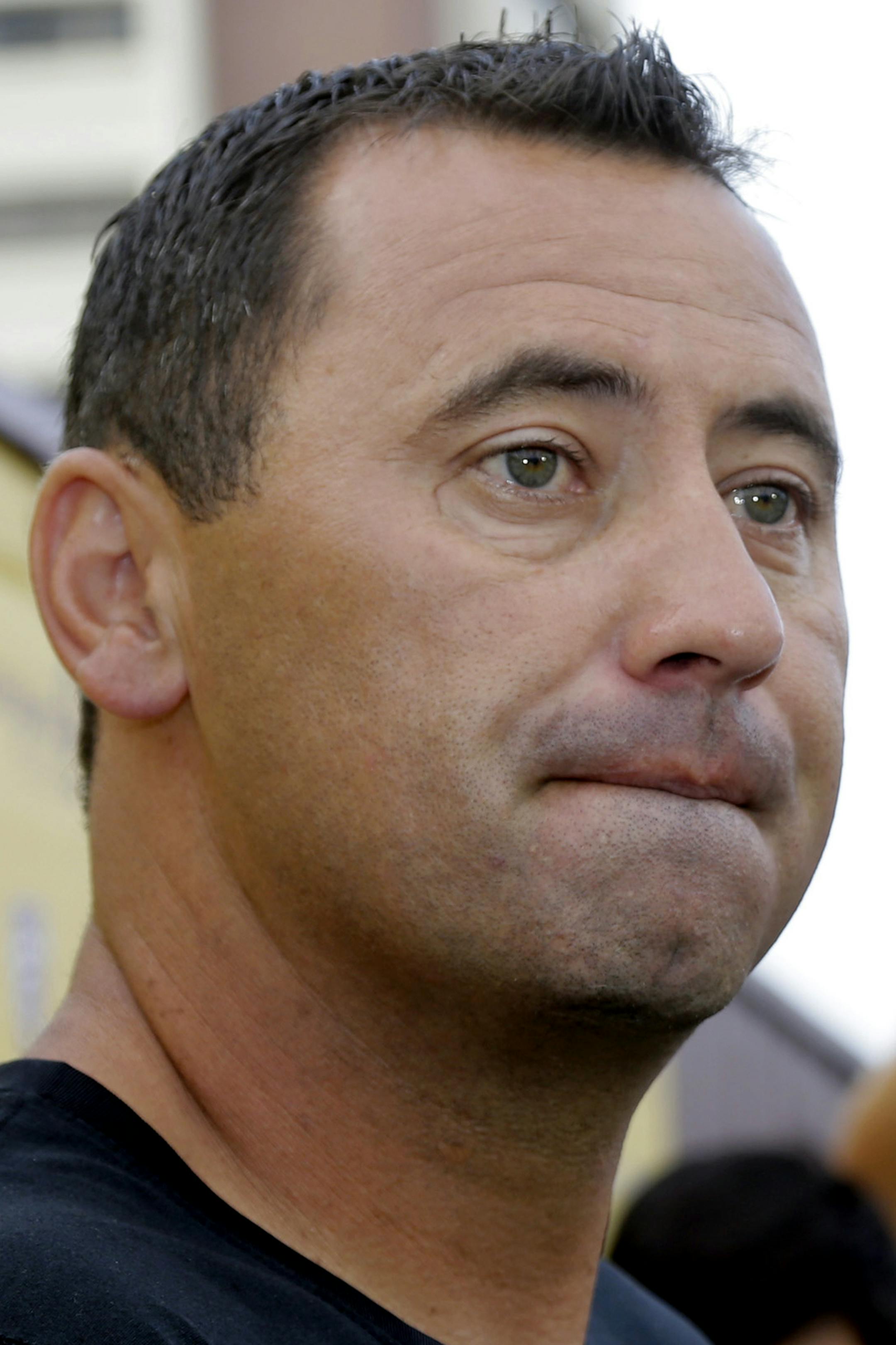 Southern California NCAA college football coach Steve Sarkisian speaks to media before football practice in Los Angeles, Tuesday, Aug. 25, 2015. Sarkisian publicly apologized for his drunken appearance at a team rally last weekend, attributing his slurred, profane speech to a combination of alcohol and medication. (AP Photo/Nick Ut)