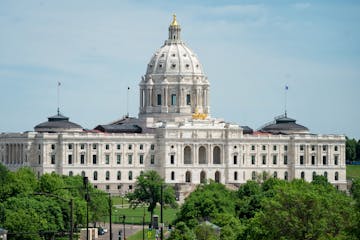 The Minnesota State Capitol will again be busy when a limited number of legislators return in mid June. In the foreground, a Civil War statue, erected