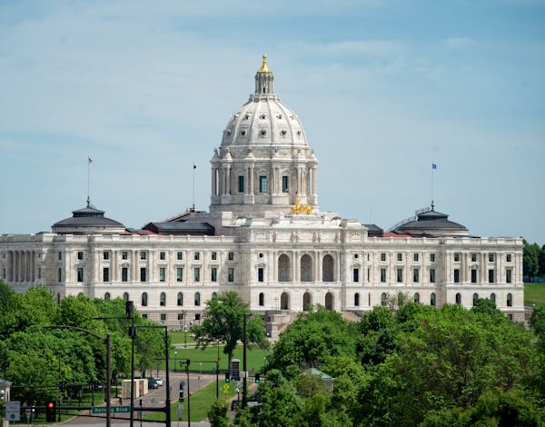 The Minnesota State Capitol will again be busy when a limited number of legislators return in mid June. In the foreground, a Civil War statue, erected