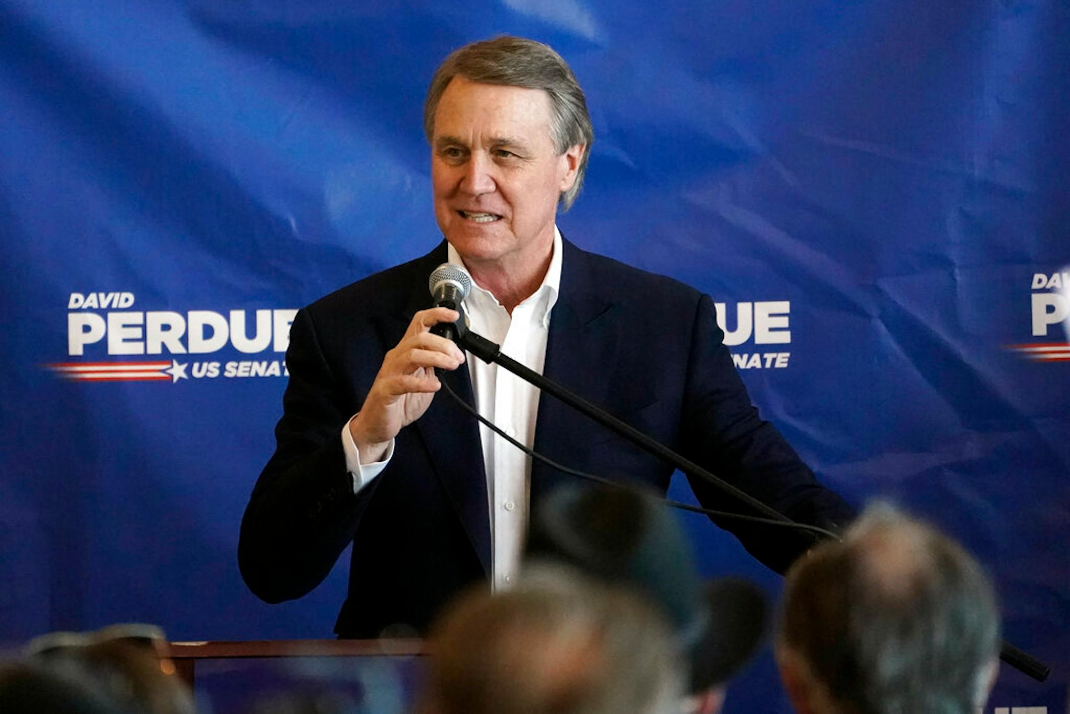 Republican candidate for Senate Sen. David Perdue speaks during a campaign stop at Peachtree Dekalb Airport Monday, Nov. 2, 2020, in Atlanta.