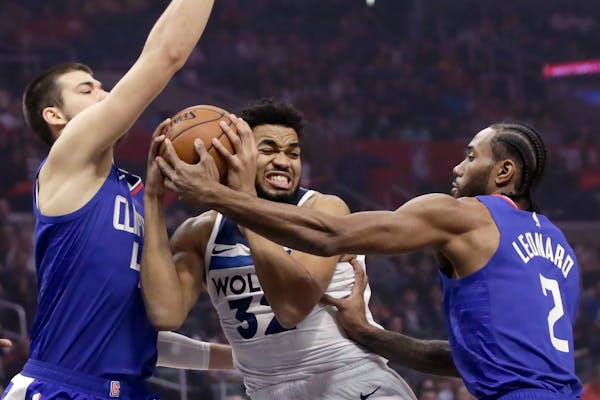 This season, Timberwolves center Karl-Anthony Towns (32) didn't make the All-Star Game cut despite averaging 27 points and 10.8 rebounds per game.
