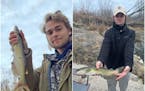 Luke Konson, left, and Daniel Balserak held an example of the Iowa state fish, the channel catfish
