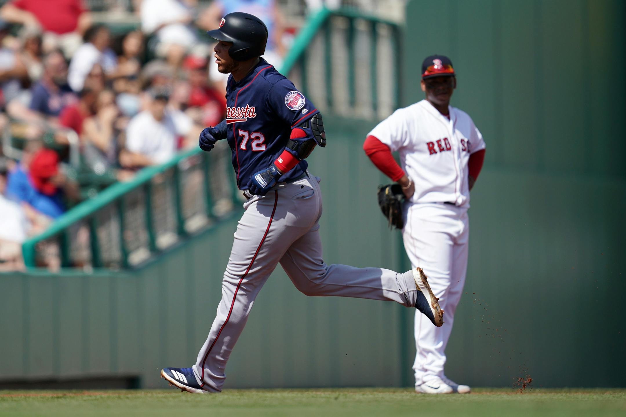 Minnesota Twins third baseman Randy Cesar (72) rounded the bases after hitting a home run during Sunday's game.
