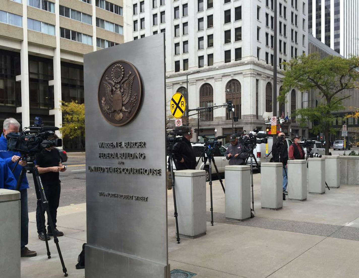 Members of the media gather outside the U.S. District Court in St. Paul on Wednesday, Nov. 4, 2015, for a hearing on child pornography charges against Daniel James Heinrich, 52, named as a "person of interest" in the Jacob Wetterling abduction 26 years ago.