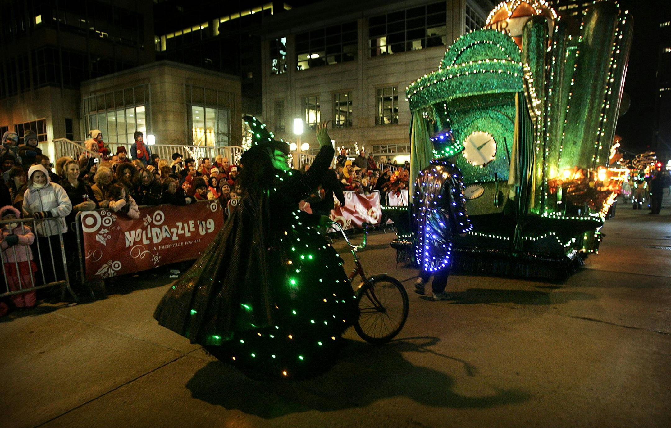 The 2009 Target Holidazzle Parade kicked off along Nicollet Mall. Parade favorite the Wicked Witch on her bike from the Wizard of Oz waves to the large opening night crowd on hand.