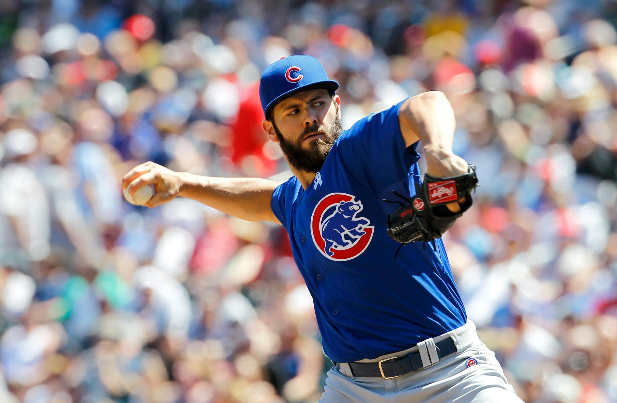 Cubs starter pitcher Jake Arrieta delivered to the Twins during the fourth inning Sunday at Target Field. Arrieta pitched a four-hit shutout.