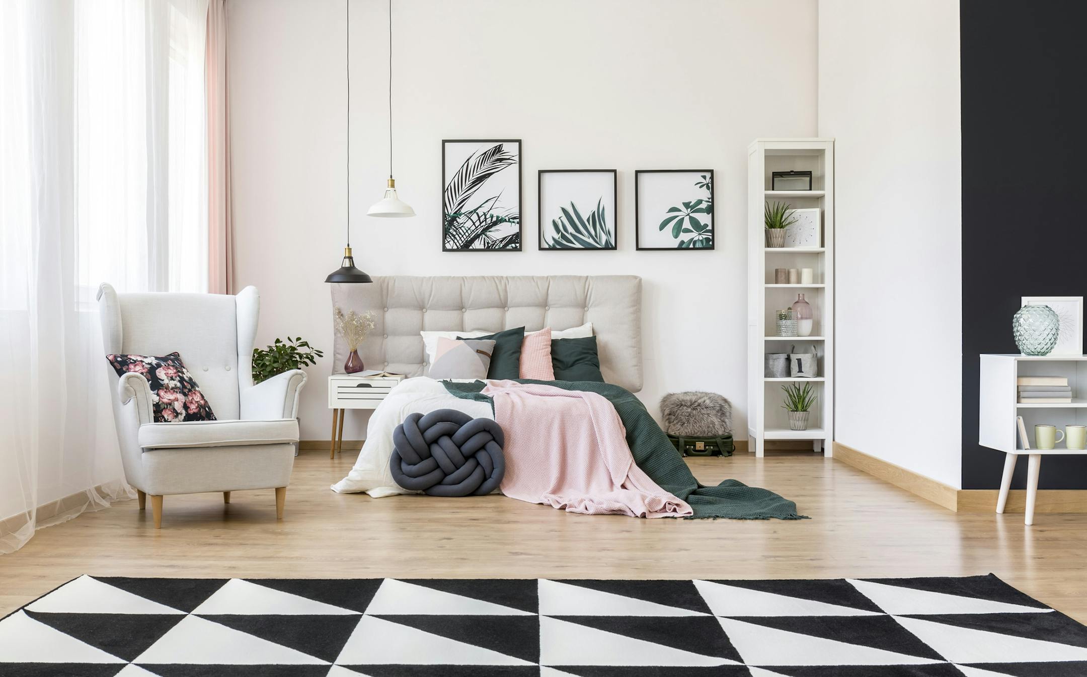 A mix of bold patterns, moody colors and nature-inspired accents makes this bedroom perfectly on trend. (Dreamstime) ORG XMIT: 1230901