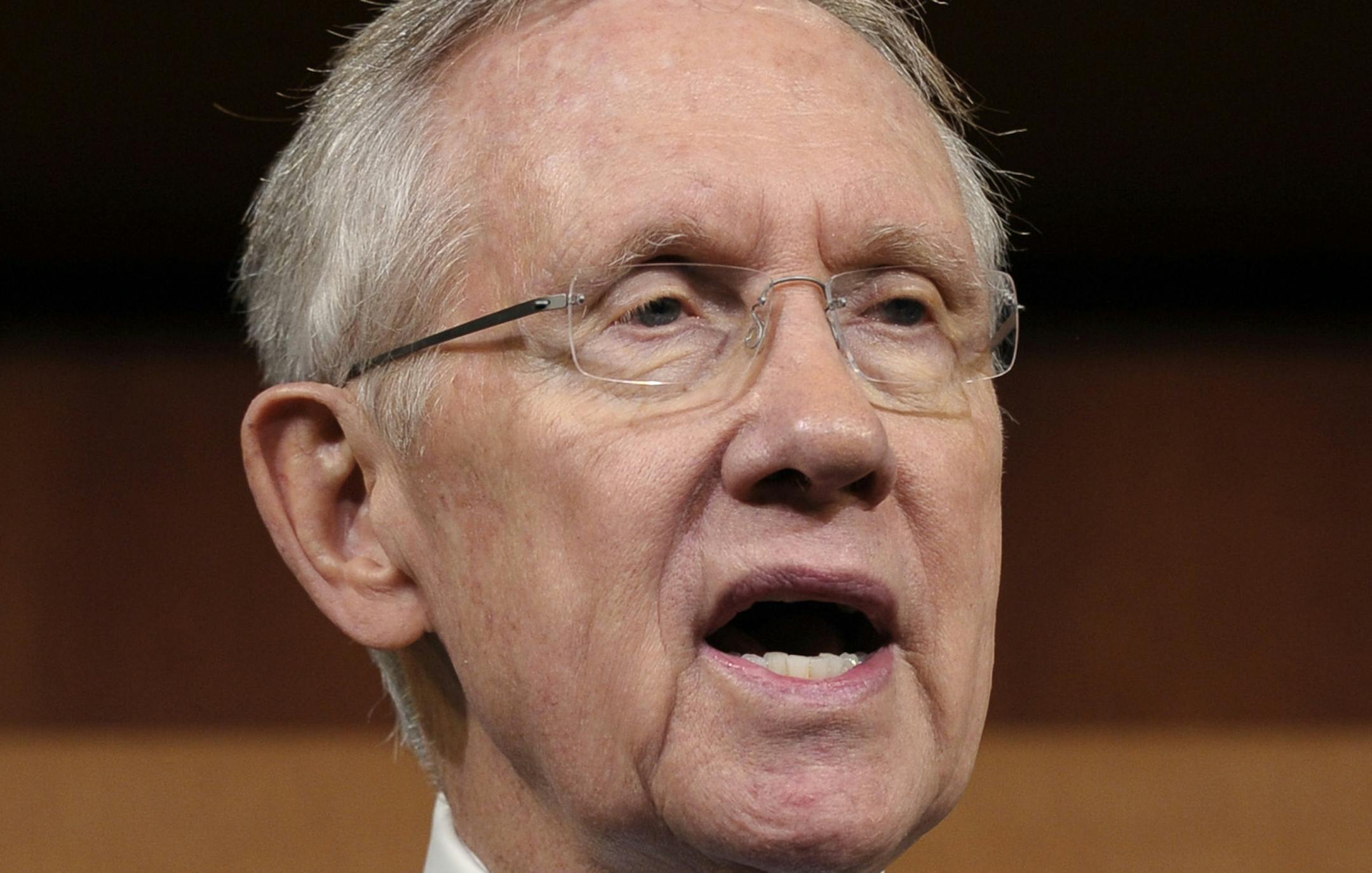 Senate Majority Leader Harry Reid of Nev. talks about unemployment benefits during a news conference on Capitol Hill in Washington, Thursday, Jan. 16, 2014. The number of Americans seeking unemployment benefits fell 2,000 last week to a seasonally adjusted 326,000, a sign that layoffs are weighing less on the job market and economic growth. (AP Photo/Susan Walsh)