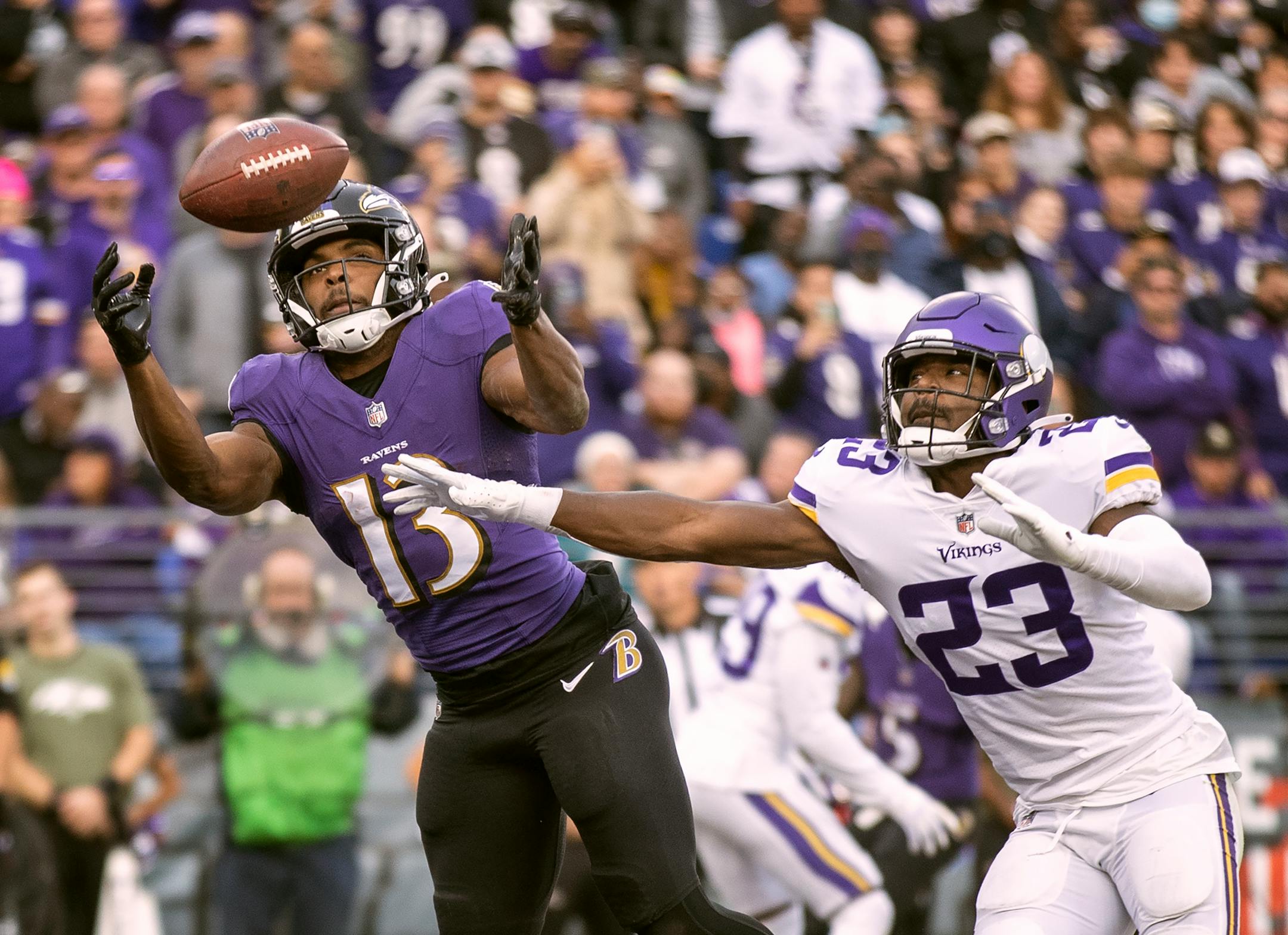 Baltimore Ravens wide receiver Devin Duvernay (13) caught a late 4th quarter touchdown over Minnesota Vikings free safety Xavier Woods (23).