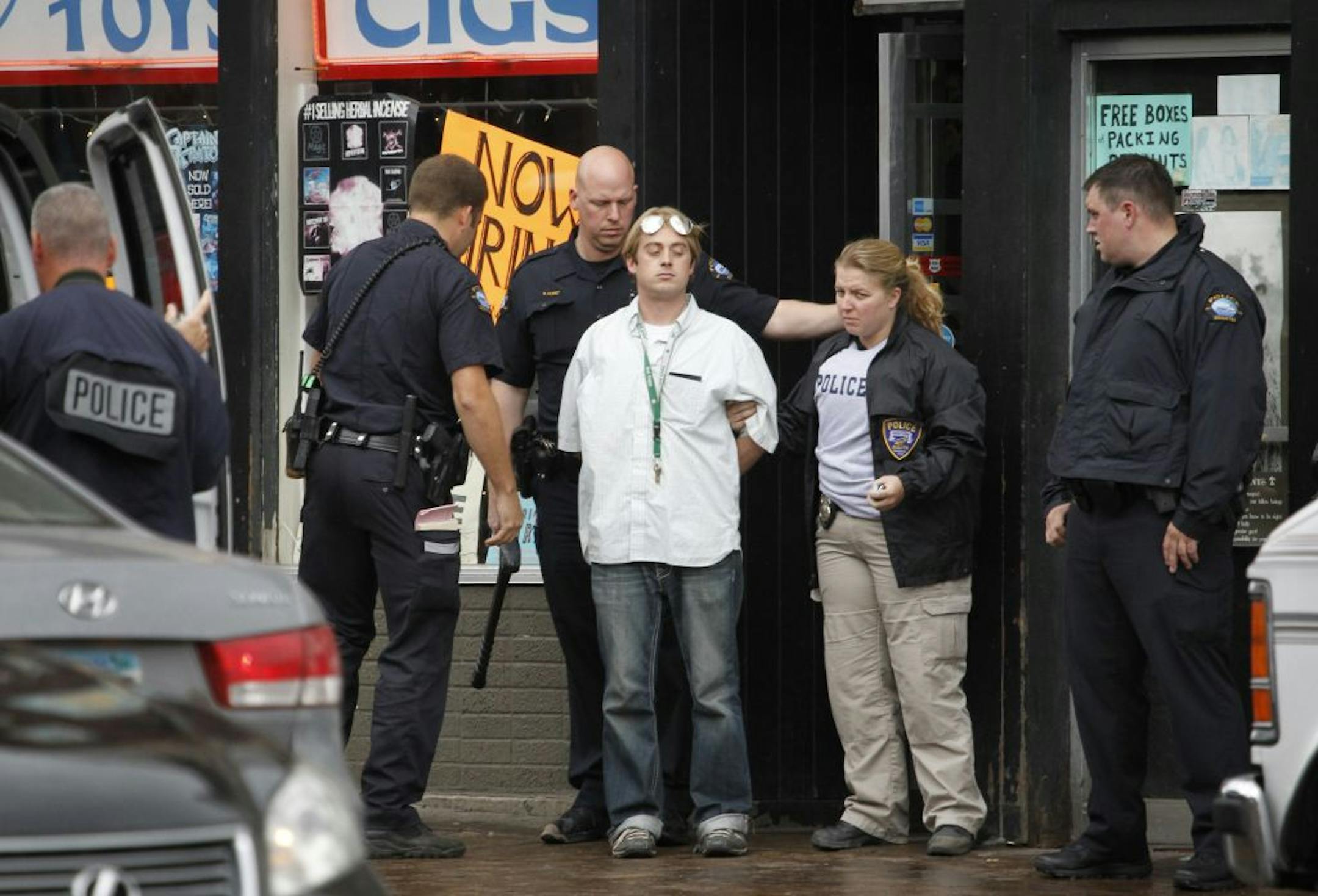 Police raided The Last Place On Earth head shop Wednesday afternoon, and store owner Jim Carlson's son, Joseph Gellerman, was arrested and taken from the store.