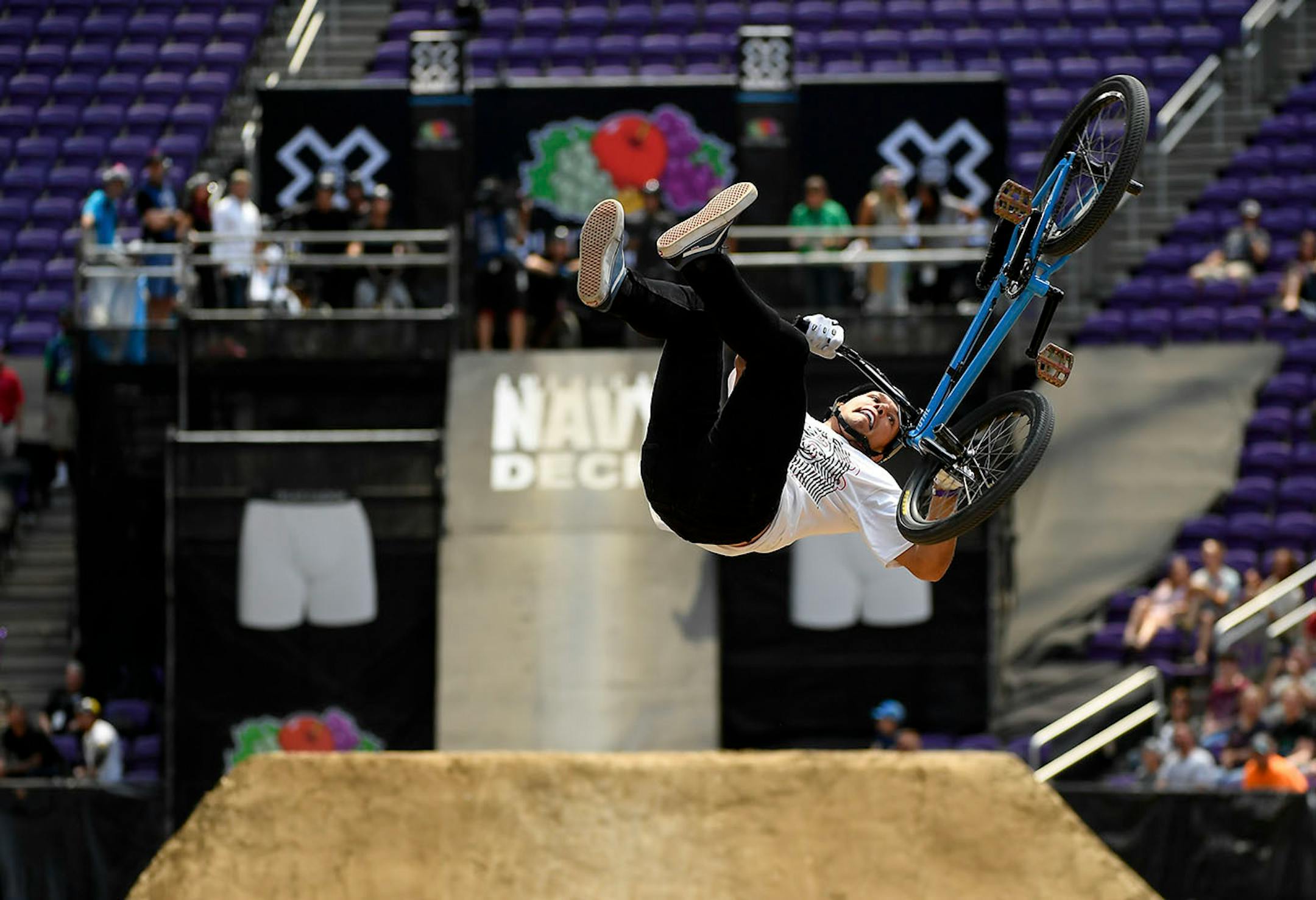 Nick Bruce attempted a backflip tailwhip during his first run in the BMX dirt finals Sunday.