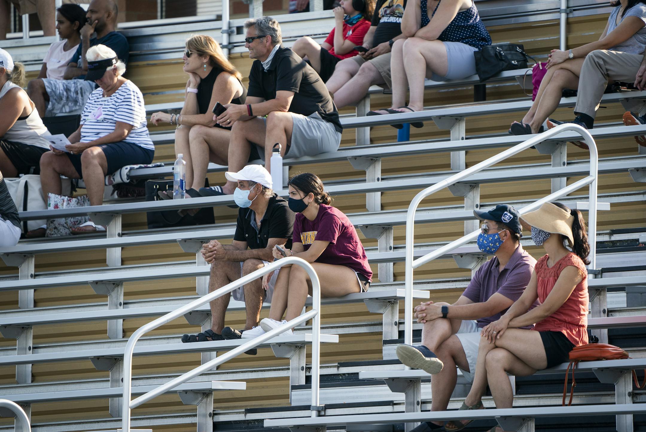 The crowd sat in the stands for the East Ridge vs. Mounds View boys soccer game. Groups were distanced from each other, with some wearing masks and some not. ] LEILA NAVIDI • leila.navidi@startribune.com BACKGROUND INFORMATION: Mounds View boys soccer plays East Ridge at East Ridge High School in Woodbury on Thursday, August 27, 2020. What is it like to play, coach, officiate and watch prep soccer in the COVID age?