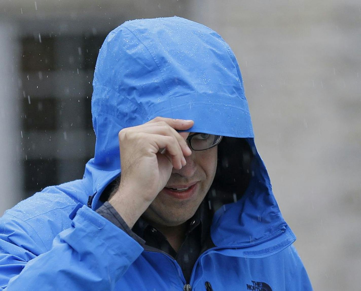 Subway restaurant spokesman Jared Fogle walks to a waiting car as he leaves his home Tuesday, July 7, 2015, in Zionsville, Ind. FBI agents and Indiana State Police have removed electronics from the property. FBI Special agent Wendy Osborne said Tuesday that the FBI was conducting an investigation in the Zionsville area but wouldn't confirm it involved Fogle.