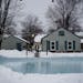 Jenna Davis embraces her larger front yard and even shares it with others in her Minneapolis neighborhood. Her neighbors have turned it into an ice sk