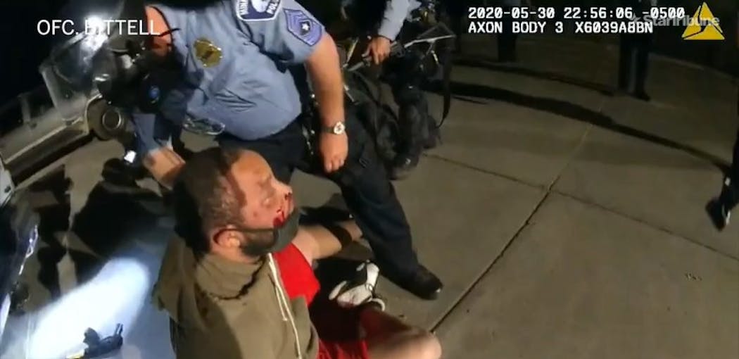 Minneapolis police body camera video showed an injured and handcuffed Jaleel Stallings in May 2020.