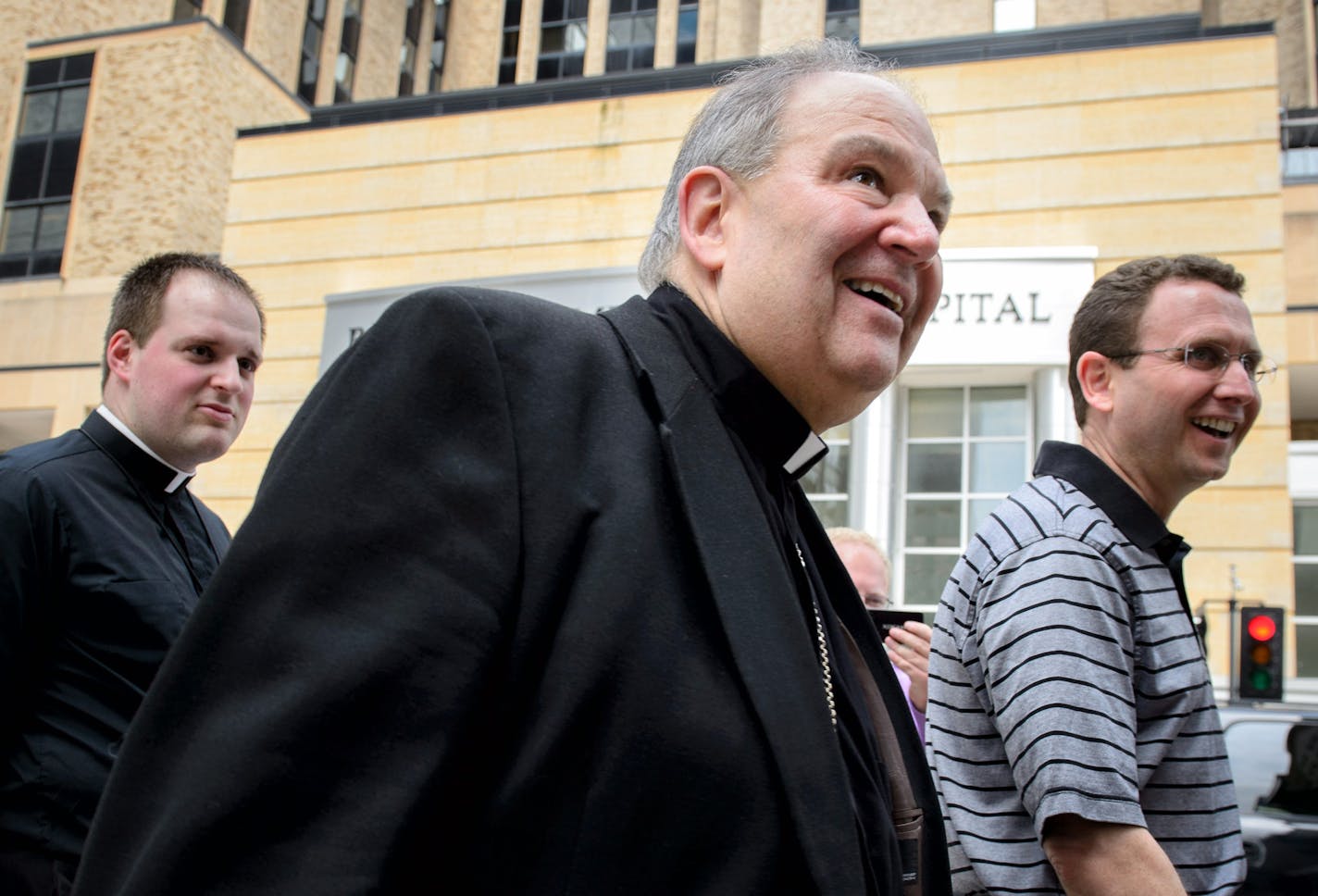 Archbishop Bernard Hebda, Apostolic Administrator of the Archdiocese of Saint Paul and Minneapolis, center, arrived in Minnesota in mid-June.