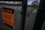 The tennis courts are Lyndale Farmstead were locked up and closed due to the Covid-19 pandemic.] RICHARD TSONG-TAATARII &#xa5; richard.tsong-taatarii@
