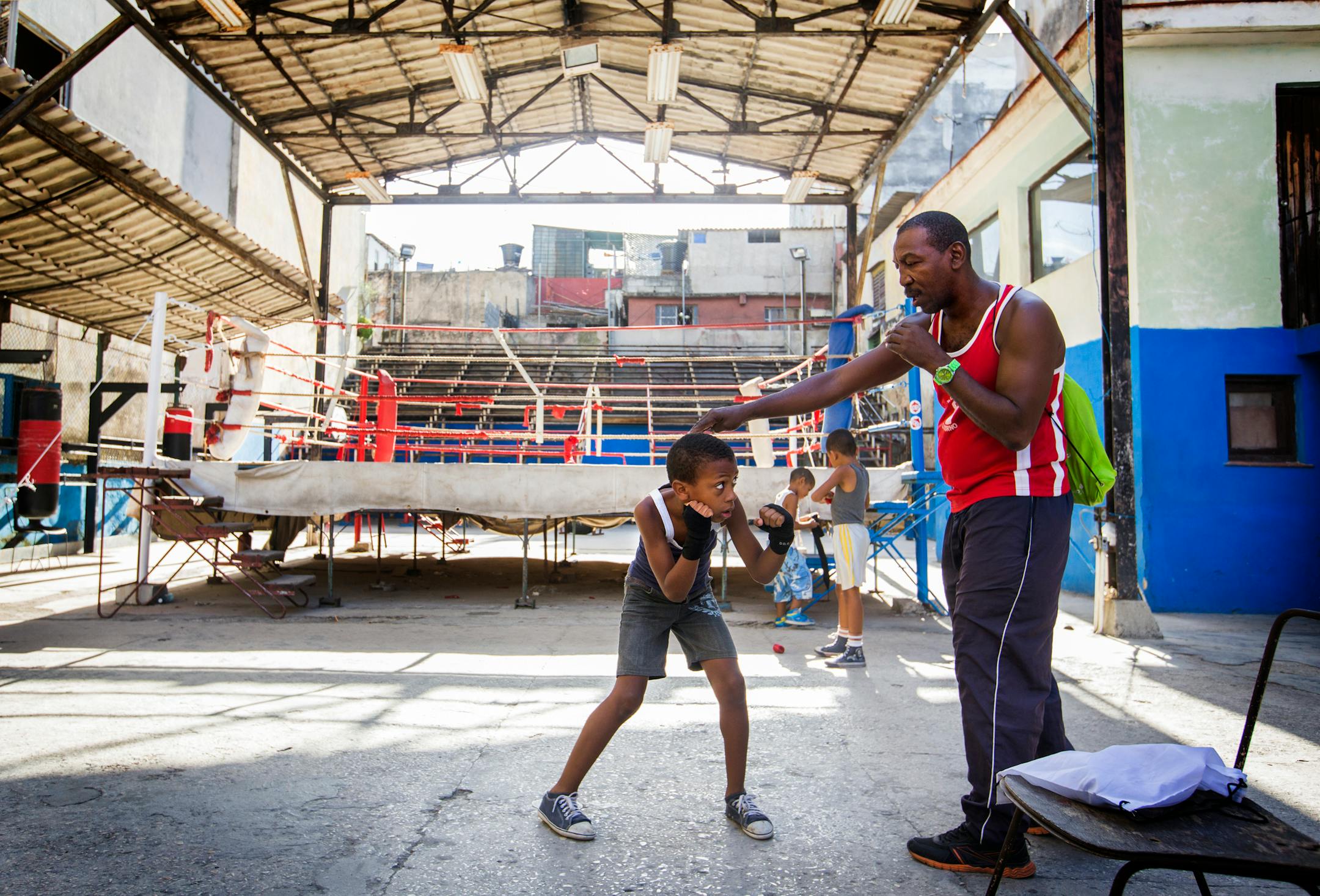 Kevin Espinoza Gonzalez, 8, takes a lesson with boxing coach Rene Pedroso at Rafael Trejo Gimnasio de Boxeo in Havana, Cuba on Saturday, May 16, 2015. ] LEILA NAVIDI leila.navidi@startribune.com /