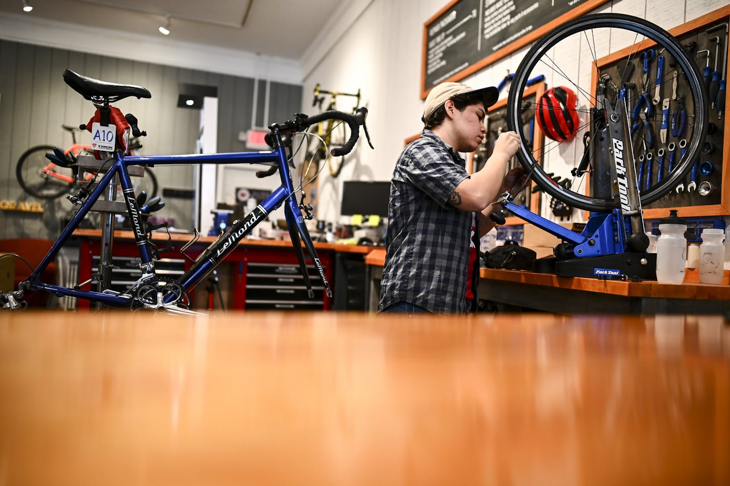 Cristina Montoya worked on tuning up a bike Friday at the Redwing Bicycle Company. ] Aaron Lavinsky &#xa5; aaron.lavinsky@startribune.com Not just bluffs, boots, and bed and breakfasts. There's also a bar where you can buy a beer for Jesus, and a bookstore where your first book is free. A rundown of what's hip in Red Wing. We photograph the Redwing Bicycle Company, Red Wing Olive Oils and Vinegars and Staghead on Friday, Jan. 18, 2019 in Redwing, Minnesota.