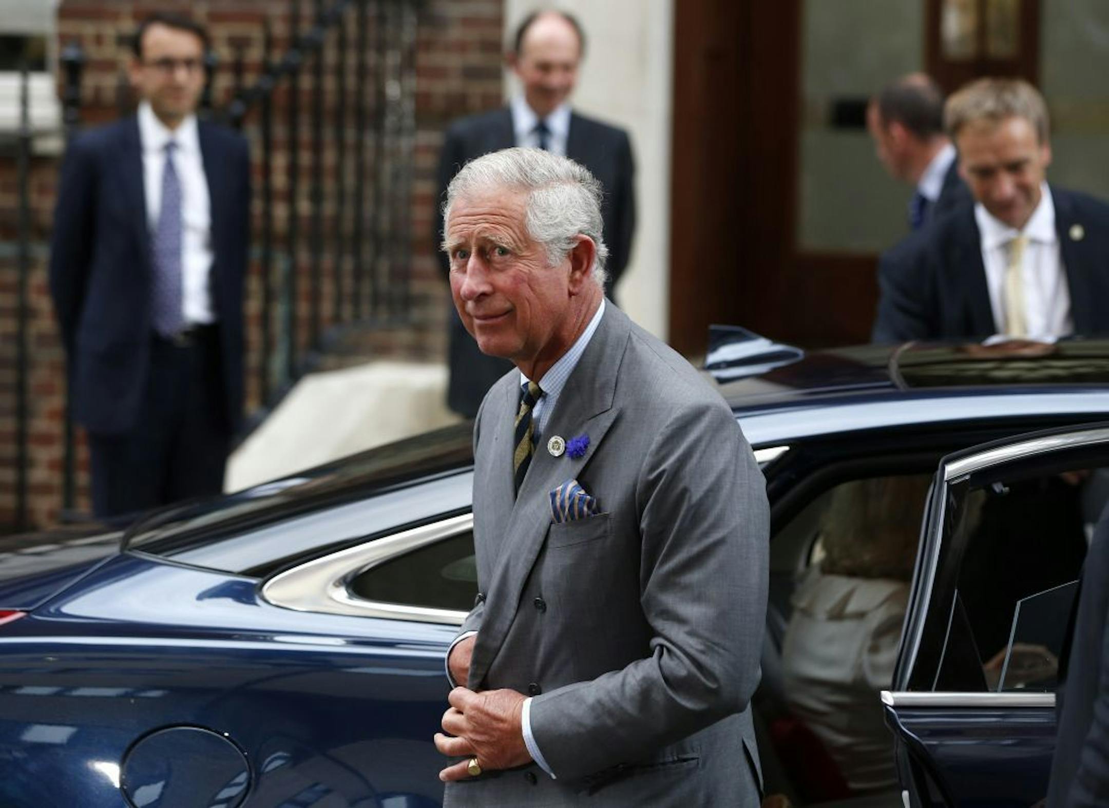 Britain's Prince Charles arrives at St. Mary's Hospital exclusive Lindo Wing in London, Tuesday, July 23, 2013, where Kate, Duchess of Cambridge, gave birth to a baby boy on Monday July 22. The royal couple are expected to head to London�s Kensington Palace from the hospital with their newly born son, the third in line to the British throne.