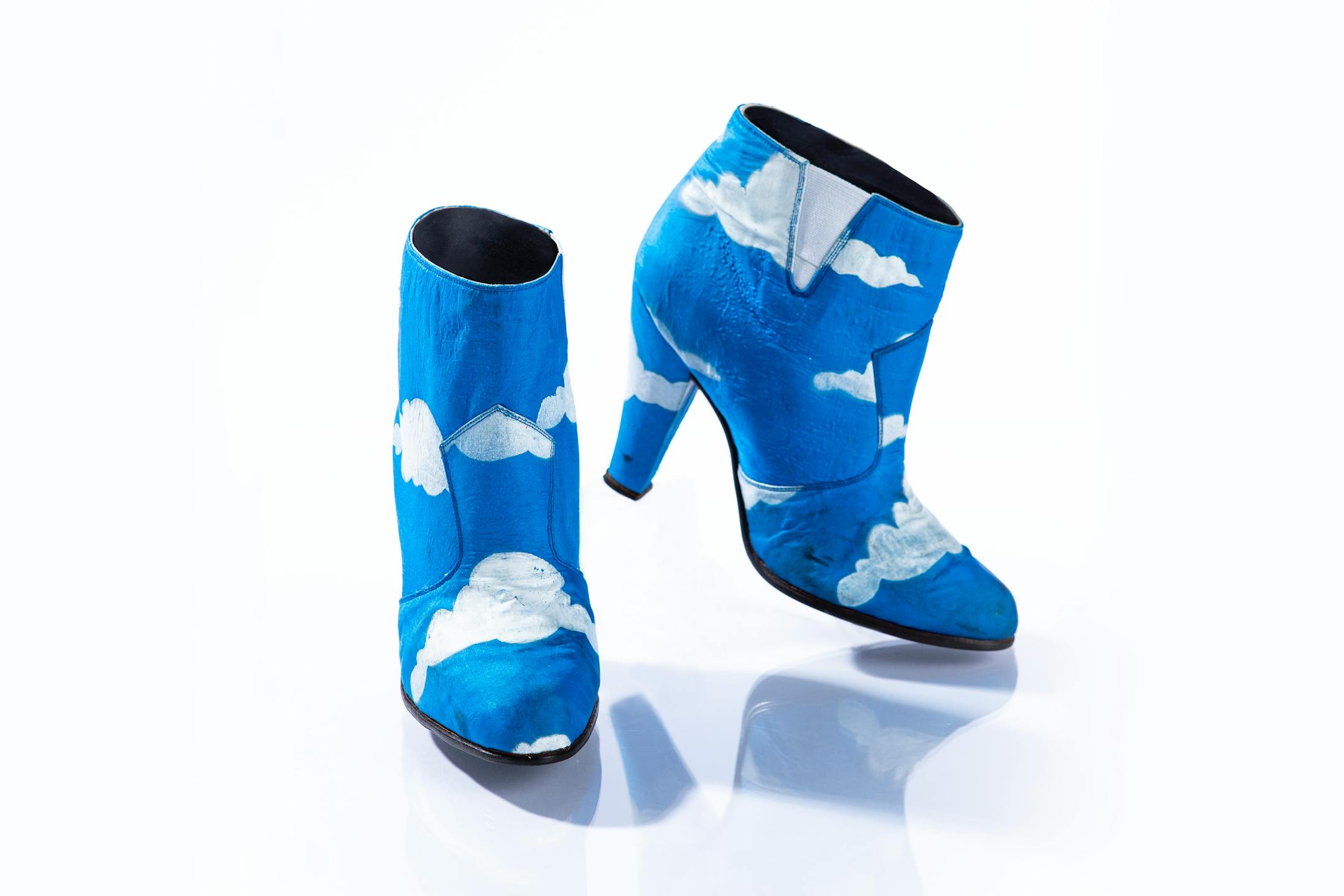 Prince rocked these iconic blue ankle boots with hand-painted white clouds in his "Raspberry Beret" music video, along with a matching suit. These shoes were made before Prince had his cobblers reinforce his heels, so two identical pairs of the shoes were made for (and survived) the arduous production of the music video.